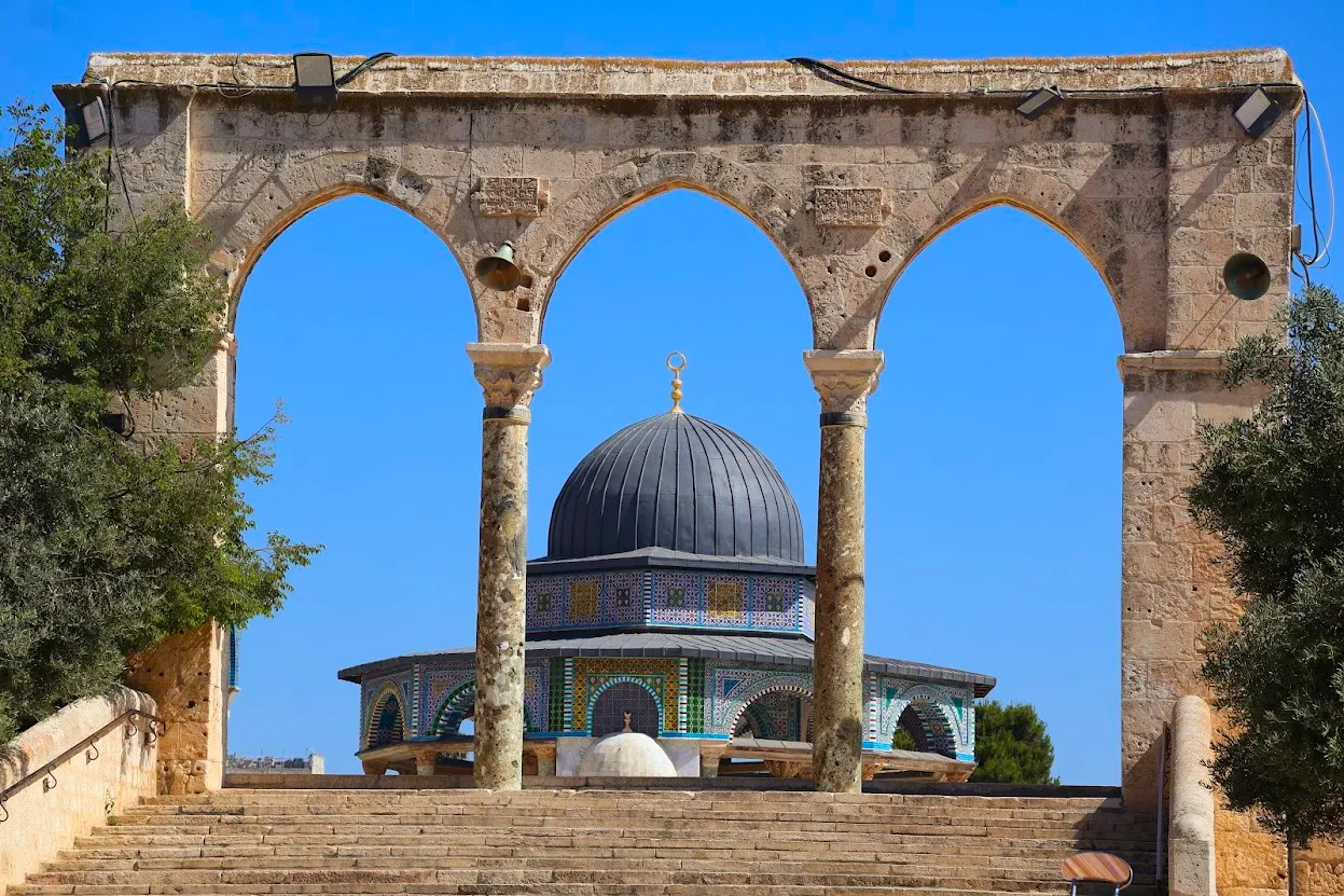 The Dome of the Rock seen through the stone arches on the Temple Mount